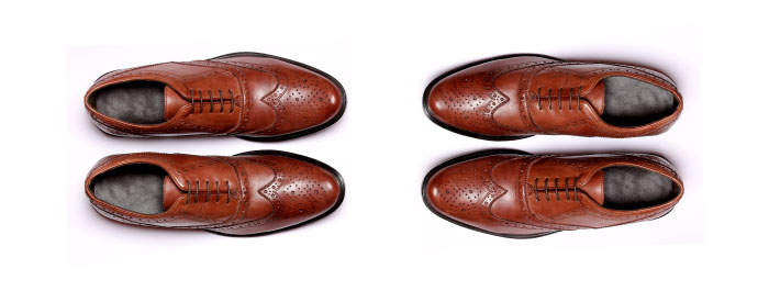 two matching pairs of brown oxford shoes