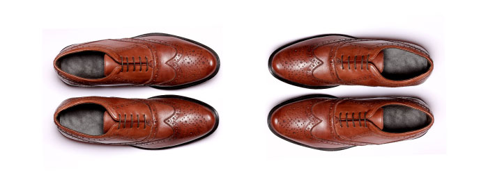 two matching pairs of brown oxford shoes