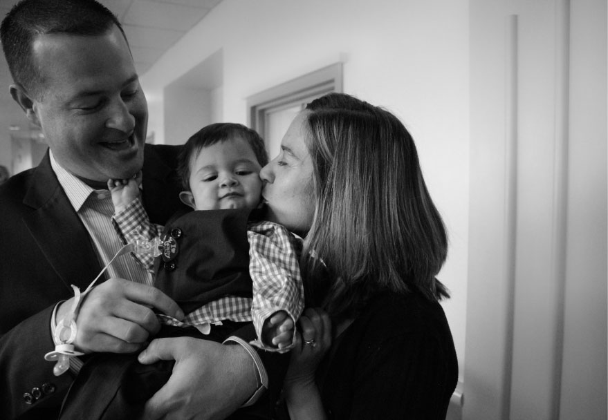 Jill and her husband on their son Matt's adoption day