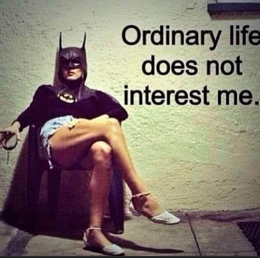 woman dresses as bat person with caption about being oridinary.